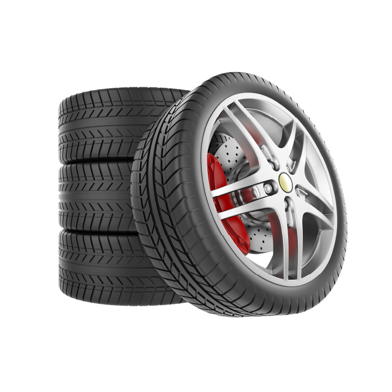 Stack of four tires next to one tire with a silver rim and red brake calipers.
