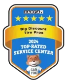 CARFAX award badge: Big Discount Tire Pros, a top-rated service center in 2024, featuring Car Fox mascot.